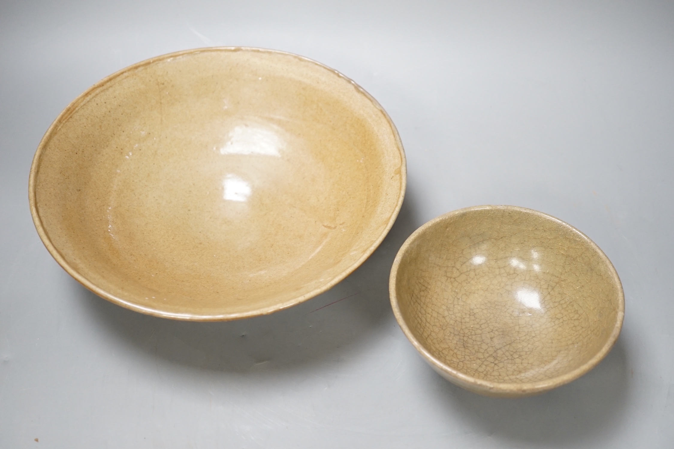 Two Chinese celadon bowls, Yuan - Min dynasty, largest 25cm